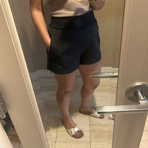 Nike Black Athletic Shorts with High Waist and Form-Fitting Design